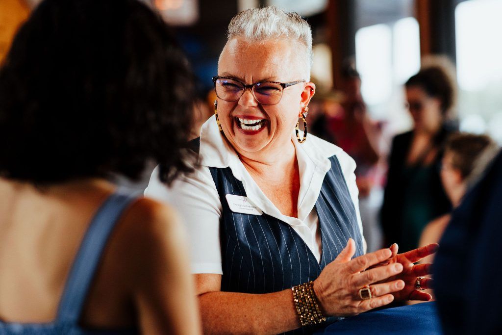 Georgia, owner of I Said Yes to Success smiling and speaking with photography business owner